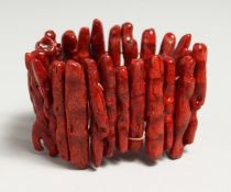 A CORAL FLEXIBLE BRACELET.