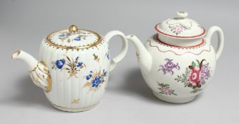 A CAUGHLEY TEAPOT AND COVER of fluted from painted with dry blue flowers and a CAUGHLEY TEAPOT AND