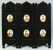 A SUPERB INDIAN SET OF SIX OVAL MINIATURE PAINTED PORTRAITS in a carved and ebonised wooden
