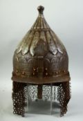 AN ISLAMIC INDO PERSIAN STEEL HELMET, engraved with calligraphy, with hanging neck guards and