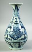 A CHINESE BLUE AND WHITE PORCELAIN VASE, painted with various stylised motifs, 25.5cm high.