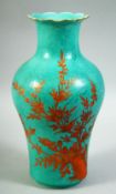 A CHINESE TURQUOISE GROUND AND CORAL RED VASE, with floral decoration in red and gilt upon incised