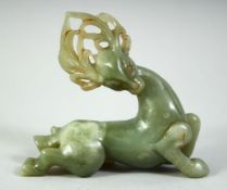 A GOOD CARVED JADE FIGURE of a stylised deer, 10.5cm long.