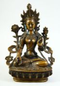 AN INDIAN BRONZE MODEL OF A SEATED DEITY, 21.5cm high.