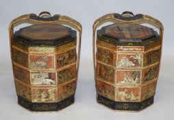 A PAIR OF CHINESE LACQUERED WOOD STACKABLE STORAGE BOXES, with cradle handles, each approx. 62cm