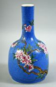 A CHINESE BLUE GROUND BOTTLE VASE, with floral decoration upon incised decoration, six character