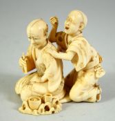 A JAPANESE CARVED IVORY OKIMONO GROUP, depicting a blind masseur and a figure with a pipe, signed to
