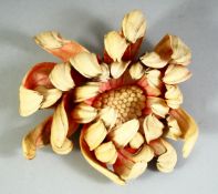 A LARGE CARVED IVORY FLOWER, 14cm wide.