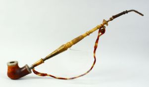 A 19TH CENTURY MEERSCHAUM PIPE with silver mounts and long turned horn handle.