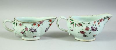 A NEAR PAIR OF 18TH CENTURY CHINESE FAMILLE ROSE PORCELAIN SAUCE BOATS, 19cm and 18.5cm long.