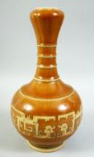 A CHINESE LIGHT BROWN GROUND PORCELAIN VASE, with a band of unusual decoration to the body, 25cm