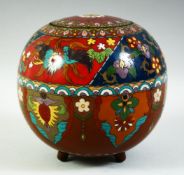 A JAPANESE CLOISONNE GLOBULAR LIDDED JAR, decorated with various floral motifs and stylised birds,