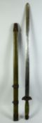 A CHINESE SHAGREEN STYLE MOUNTED SWORD, with watered steel blade, the blade with engraved