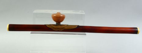 A CHINESE METAL AND IVORY MOUNTED HARDWOOD OPIUM PIPE, 49.5cm long.