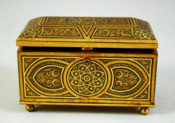 A VERY FINE ISLAMIC SPANISH TOLEDO GOLD INLAID LIDDED CASKET, the hinged lid opening to reveal a red