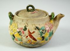 AN UNUSUAL CHINESE COLOURED YIXING TEAPOT, 12cm diameter.