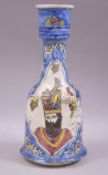A 19TH CENTURY PERSIAN QAJAR POTTERY HUQQA BASE, painted with two portrait panels, 29cm high.