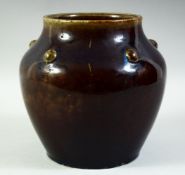 A CHINESE FLAMBLE GLAZE BULBOUS VASE, the shoulder with five raised bosses, with six character