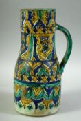 A FINE LARGE 19TH CENTURY MOROCCAN GLAZED POTTERY JUG, 26cm high.