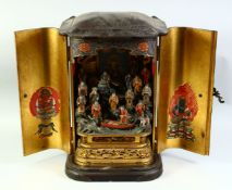 A SUPERB LACQUERED AND CARVED WOOD BUTSUDAN HOME ALTER, the doors opening to reveal many carved