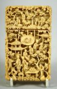 A CHINESE CANTON CARVED IVORY CARD CASE, carved with village scenes including many figures in