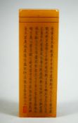 A CHINESE RECTANGULAR STONE SEAL, inscribed with columns of characters, 1.4in x 0.6in at base & 3.