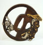A JAPANESE BRONZE SHAKUDO TSUBA, of unusual form depicting a bearded figure and a demon, signed
