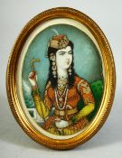 AN INDIAN MINIATURE OVAL PORTRAIT depicting the wife of Muhammad Shah, on ivory, encasced within a