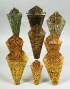 A FINE COLLECTION OF NINE 19TH CENTURY THAI ENAMELLED SILVER AND GILT METAL BETEL LEAF HOLDERS, (