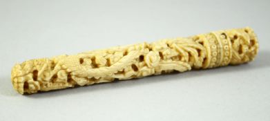 A CHINESE CANTON CARVED IVORY BODKIN CASE, 9.5cm long.