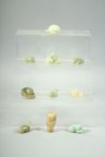 TEN SMALL CHINESE JADE CARVINGS, including figures and animals, (10).