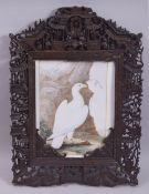 A CHINESE CARVED AND PIERCED WOODEN FRAME, 41.5cm x 30cm (af).