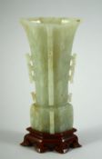 A 17TH CENTURY CHINESE CARVED JADE FACETED GU VASE Kangxi, the upper section of hexagonal form and