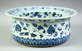 A LARGE CHINESE BLUE AND WHITE PORCELAIN WASH BOWL, decorated with lotus, vine and with treasure