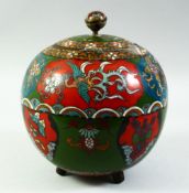 A JAPANESE CLOISONNE GLOBULAR LIDDED JAR, decorated with various floral motifs, stylised birds and
