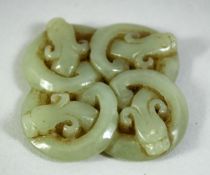 A SMALL CARVED AND PIERCED JADE PENDANT, 4.5cm square.