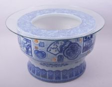 A LARGE JAPANESE ARITA BLUE AND WHITE PORCELAIN HIBACHI, possibly Taisho period, decorated with