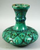 A NORTH AFRICAN MOROCCAN GLAZED POTTERY VASE, 21.5cm high.