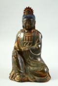 A CHINESE BRONZE BUDDHA, with traces of gilt and red paint, 24cm high.