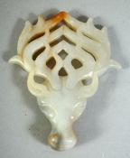 A CARVED JADE / HARDSTONE DEER HEAD, 8.5cm.