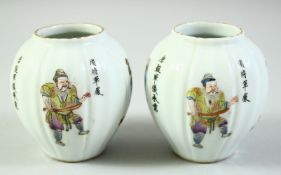 A SMALL PAIR OF CHINESE PORCELAIN JARS, painted with various figures and calligraphy, each base with