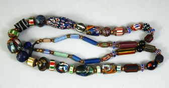 AN ISLAMIC GLASS BEADED NECKLACE, of various styles and forms.