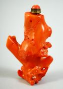 A CHINESE RED CORAL SNUFF BOTTLE & STOPPER, 2.9in high overall.