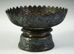 A LARGE 19TH CENTURY THAI SILVER LOTUS SHAPED OFFERING FOOTED TRAY, with Chinese hallmarks to