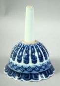 A CHINESE BLUE AND WHITE PORCELAIN PETAL FORMED FUNNEL, with six character mark, 16cm long.