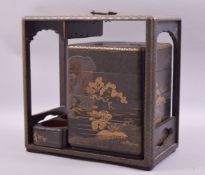 A 19TH CENTURY JAPANESE LACQUER PICNIC BOX with gilt decoration, the box containing four stacking