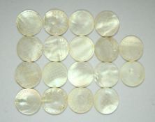 A COLLECTION OF CHINESE MOTHER OF PEARL CIRCULAR GAMING COUNTERS, (18).
