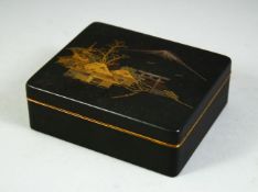 A JAPANESE KOMAI CIGARETTE BOX, the lid illustrated with a village scene and mount fuji beyond,
