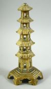 A BRASS MODEL OF A PAGODA, 19.5cm high.