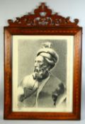 A LARGE CHARCOAL PORTRAIT OF A PERSIAN POET, in an inlaid and carved wood frame and glazed, signed